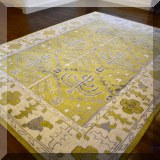 DR03. Safavieh “Stonewash” yellow rug. Measures approx. 9' x 12' 